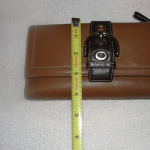 beautiful brown leather wallet by coach